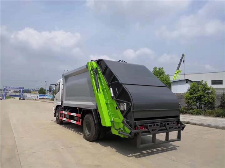 東風(fēng)天錦10-12噸壓縮垃圾車多方位圖片三